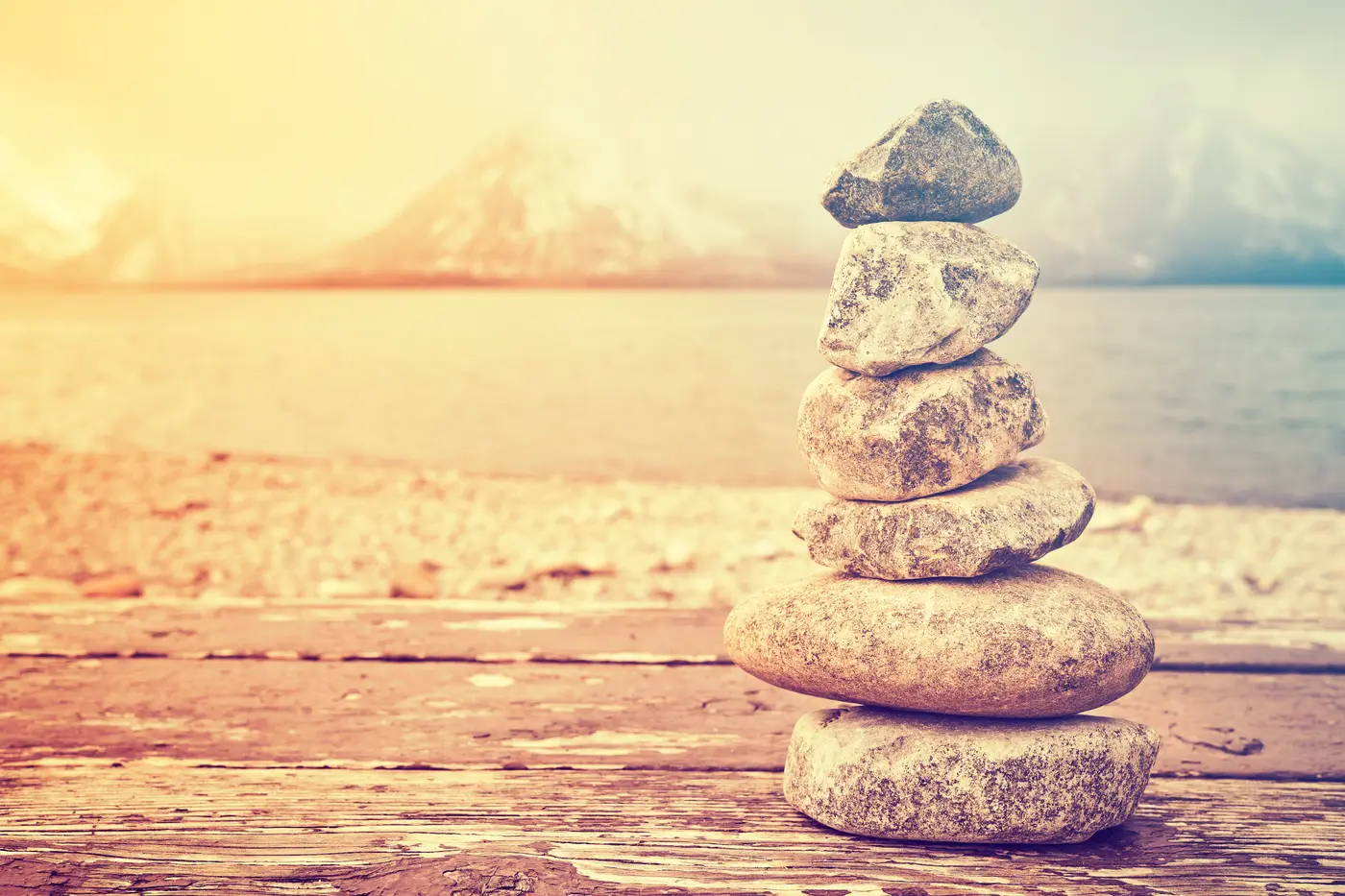 Vintage toned stack of stones, balance and harmony concept. Vintage toned stack of stones, balance and harmony concept, Grand Teton National Park, Wyoming, USA.